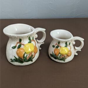 Vintage Arnels Pair of Measuring Cups VG